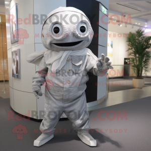 Silver Cod mascot costume character dressed with a Overalls and Shawl pins
