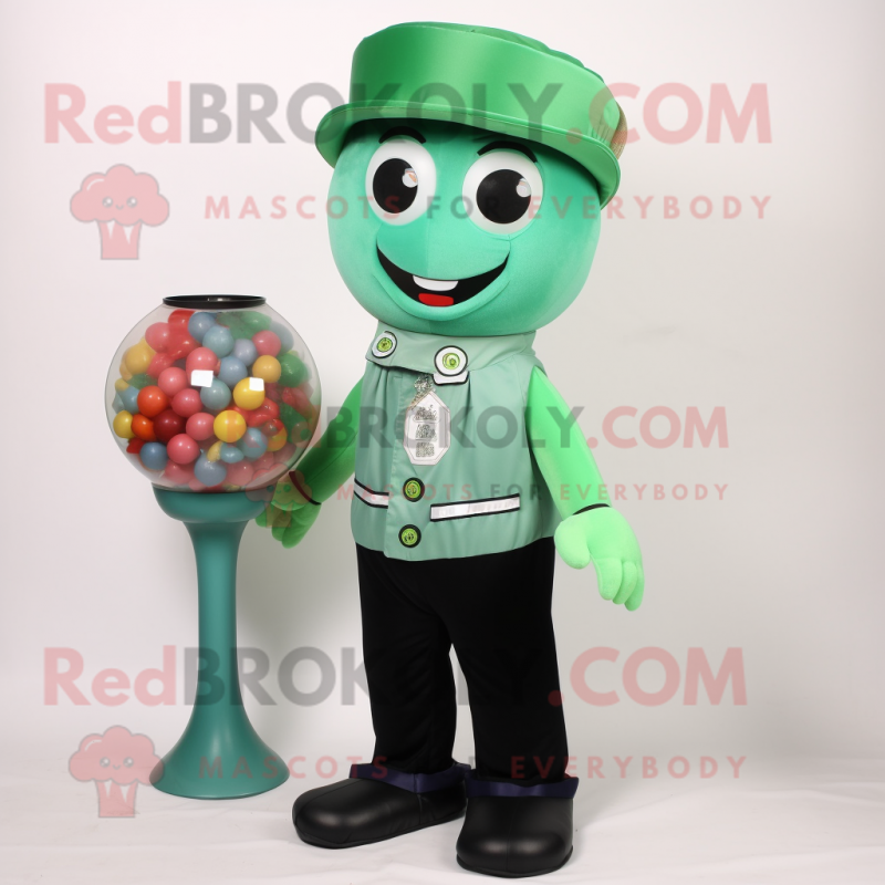 Green Gumball Machine mascot costume character dressed with a Jeggings and Hat pins