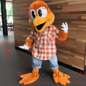 Maskotkarakter af en orange...