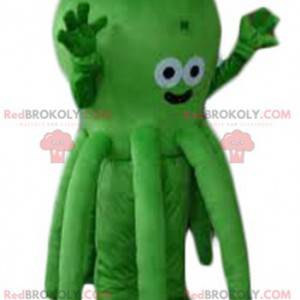 Heel schattig en glimlachend groene octopus mascotte -