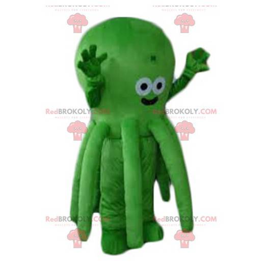 Heel schattig en glimlachend groene octopus mascotte -