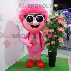 Maskotkarakter av en rosa...