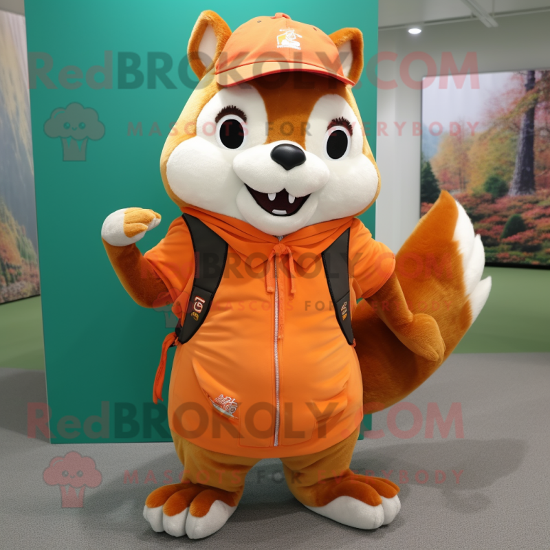 Orange Chipmunk mascot costume character dressed with a Bermuda Shorts and Shawl pins