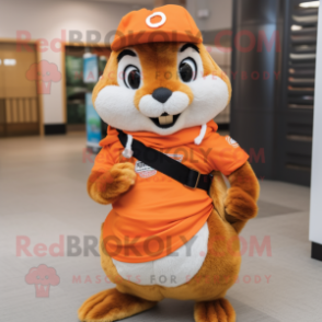 Orange Chipmunk mascot costume character dressed with a Bermuda Shorts and Shawl pins