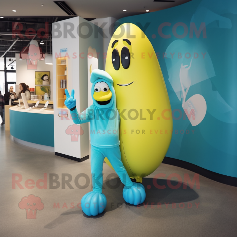 Cyan Banana mascot costume character dressed with a Long Sleeve Tee and Brooches Cyan Banana mascot costume character dressed with a Long Sleeve Tee and Brooches
