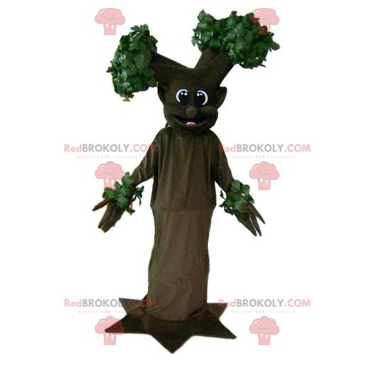 Mascotte d'arbre marron et vert géant et souriant -