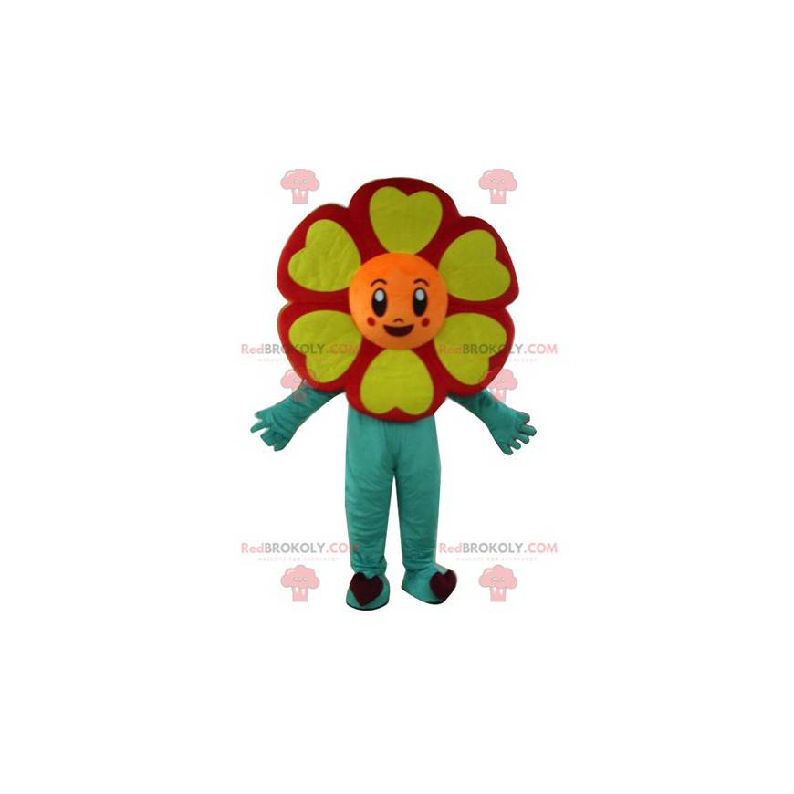 Very smiling red orange yellow and green flower mascot -