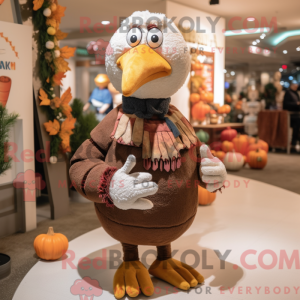 Mascot karakter van een Tan...