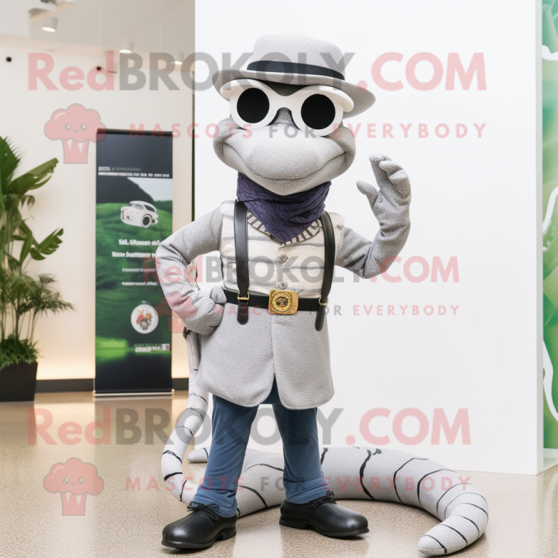 Silver Snake mascot costume character dressed with a Waistcoat and Eyeglasses Silver Snake mascot costume character dressed with a Waistcoat and Eyeglasses