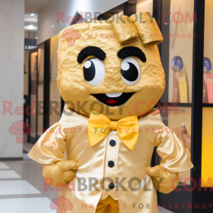 Maskot karakter af en guld...