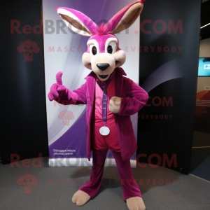 Magenta Gazelle mascot costume character dressed with a Coat and Cufflinks