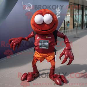 Maskotfigur af en rødbrun...