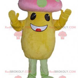 Mascot grote gele en roze paddestoel met groene stippen -