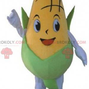 Mascote gigante de sabugo de milho verde e amarelo -