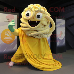 Lemon Yellow Medusa mascot costume character dressed with a Rugby Shirt and Shawl pins