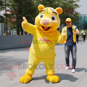 Yellow Sow mascot costume character dressed with a Flare Jeans and Watches