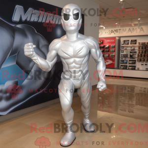 Maskotfigur av en silver...