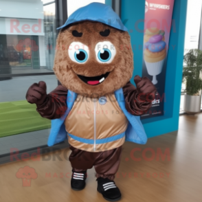 Brown Cupcake mascot costume character dressed with a Windbreaker and Backpacks