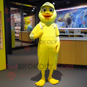 Lemon Yellow Gull mascot costume character dressed with a Overalls and Anklets