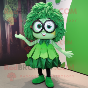 Forest Green Momentum mascot costume character dressed with a Skirt and Eyeglasses