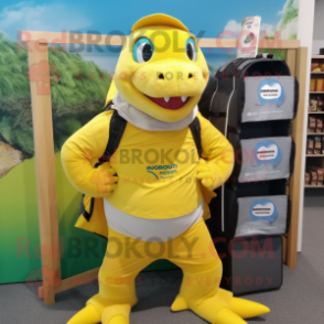 Lemon Yellow Komodo Dragon mascot costume character dressed with a Board Shorts and Backpacks