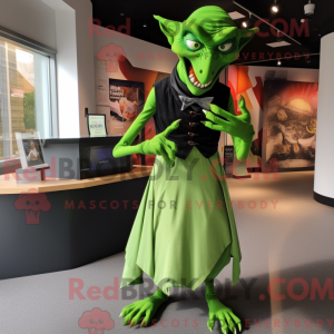 Maskot karakter af en grøn...