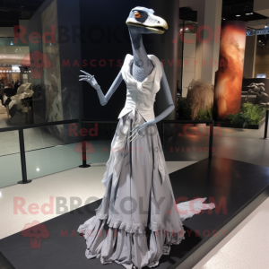 Gray Coelophysis mascot costume character dressed with a Evening Gown and Hairpins