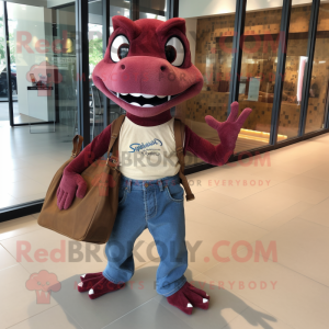 Maroon Lizard mascot costume character dressed with a Denim Shorts and Tote bags