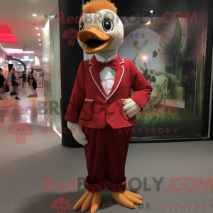Mascottefiguur van een rood...