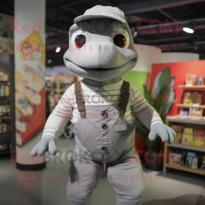Gray Lizard mascot costume character dressed with a Overalls and Wraps