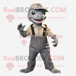 Gray Lizard mascot costume character dressed with a Overalls and Wraps