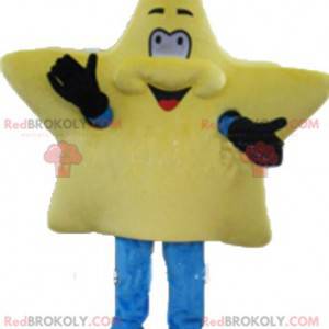 Leuke en lachende gigantische gele ster mascotte -