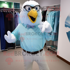 Cyan Eagle mascot costume character dressed with a Poplin Shirt and Cufflinks