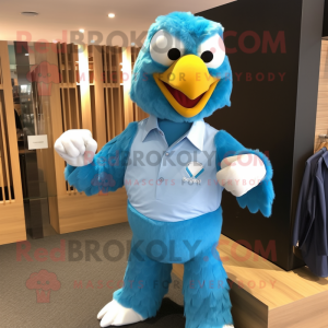 Cyan Eagle mascot costume character dressed with a Poplin Shirt and Cufflinks