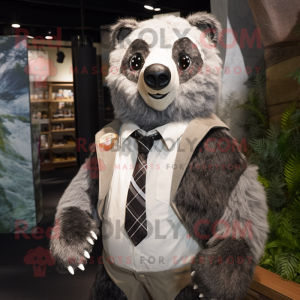 Silver Spectacled Bear mascot costume character dressed with a Cardigan and Ties