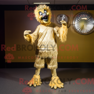 Maskotfigur af en guld-emu...