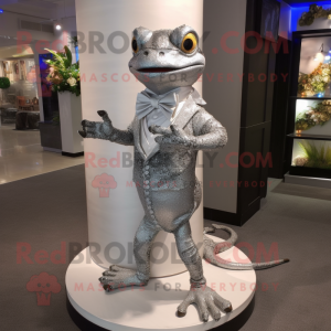 Silver Geckos mascot costume character dressed with a Evening Gown and Bow ties