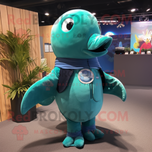 Teal Humpback Whale mascot costume character dressed with a Vest and Rings