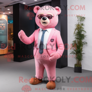 Maskotkarakter av en rosa...