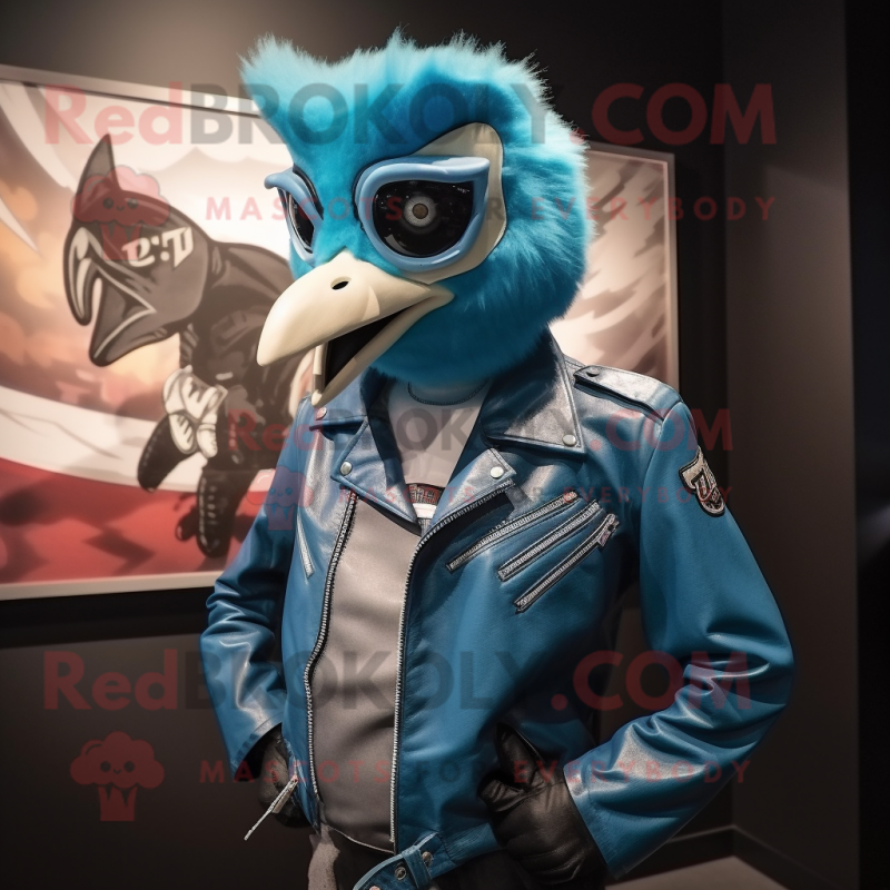 Teal Blue Jay mascot costume character dressed with a Biker Jacket and Lapel pins Teal Blue Jay mascot costume character dressed with a Biker Jacket and Lapel pins