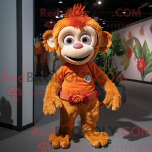 Maskotfigur af en orange...