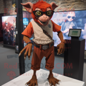 Rust Gargoyle mascot costume character dressed with a Jeggings and Smartwatches