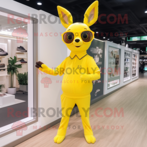 Lemon Yellow Roe Deer mascot costume character dressed with a Joggers and Eyeglasses