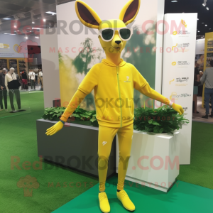 Lemon Yellow Roe Deer mascot costume character dressed with a Joggers and Eyeglasses