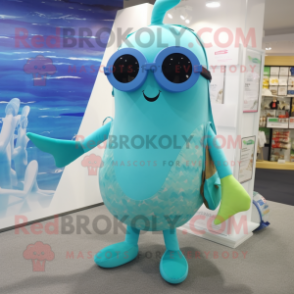 Turquoise Narwhal mascot costume character dressed with a Swimwear and Eyeglasses