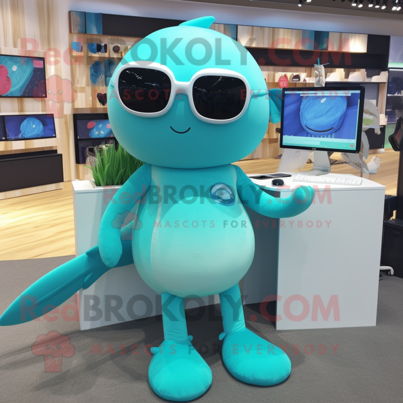 Turquoise Narwhal mascot costume character dressed with a Swimwear and Eyeglasses