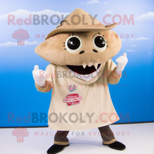 Beige Stingray mascot costume character dressed with a Rugby Shirt and Hat pins