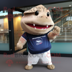 Beige Stingray mascot costume character dressed with a Rugby Shirt and Hat pins