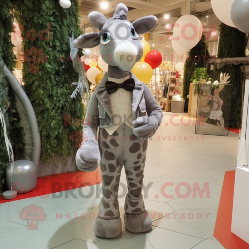 Gray Giraffe mascot costume character dressed with a Playsuit and Bow ties