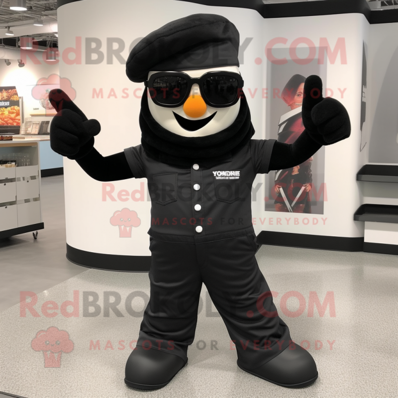 Black Horseshoe mascot costume character dressed with a Romper and Sunglasses Black Horseshoe mascot costume character dressed with a Romper and Sunglasses